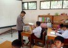BHABINKAMTIBMAS POLSEK NYALINDUNG DI DESA MEKARSARI MONITORING PROGRAM MAKAN BERGIZI GRATIS DI SDN CARINGIN