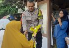 Polsek Parungkuda Polres Sukabumi Monitoring Penyaluran Bantuan Pangan di Desa Sundawenang Berjalan Lancar